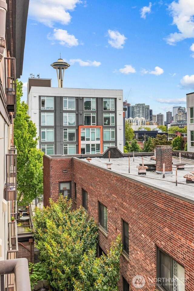 323 Queen Anne Ave N Unit 502, Seattle, WA 98109 - view of building exterior with a city view