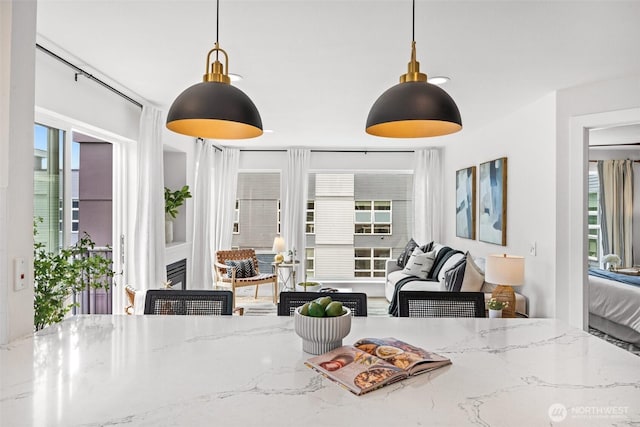 323 Queen Anne Ave N Unit 502, Seattle, WA 98109 - dining area featuring healthy amount of natural light