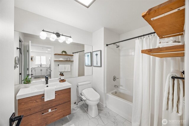 323 Queen Anne Ave N Unit 502, Seattle, WA 98109 - full bath with toilet, vanity, shower / bath combo with shower curtain, and tile patterned floors