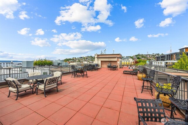 323 Queen Anne Ave N Unit 502, Seattle, WA 98109 - view of patio / terrace featuring outdoor dining space