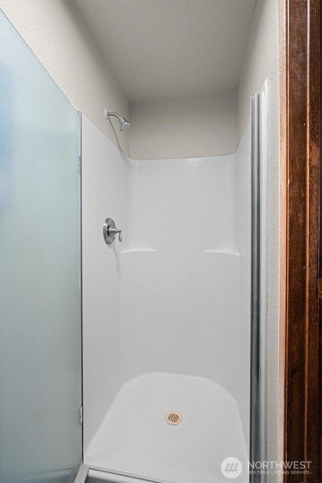 full bath with a stall shower