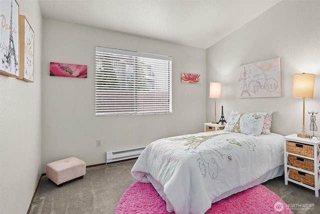 bedroom featuring a baseboard heating unit and dark colored carpet