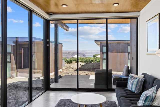 23648 NW Cliffe Pointe Rd Unit 10B, Quincy, WA 98848 - sunroom / solarium featuring a mountain view and wooden ceiling