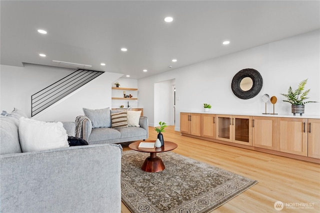 312 N State St Unit 101, Bellingham, WA 98225 - living room with light wood finished floors, stairs, and recessed lighting