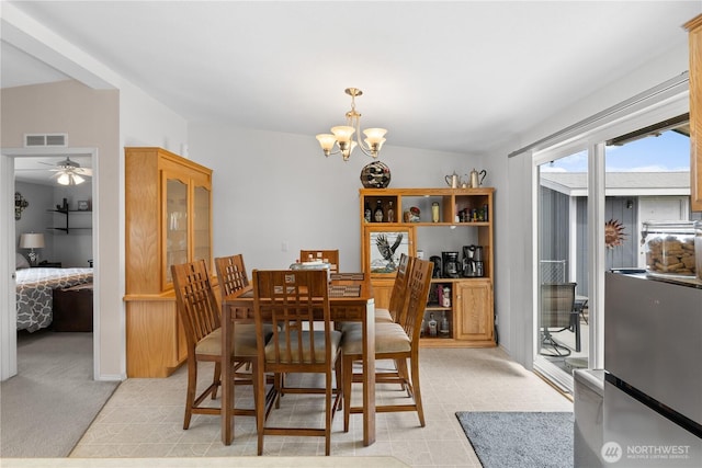 101 Lake Pl SW Unit 328, Mattawa, WA 99349 - dining area featuring a chandelier and ceiling fan