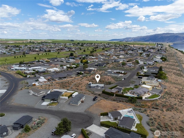 101 Lake Pl SW Unit 328, Mattawa, WA 99349 - aerial perspective of suburban area with a mountainous background