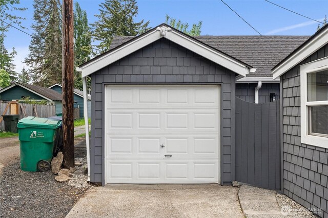 17291725 5th Ave SE, Olympia, WA 98501 - garage featuring fence and concrete driveway