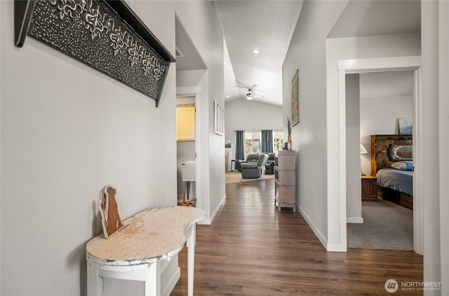 11975 NE Neppel Rd, Moses Lake, WA 98837 - hallway with lofted ceiling, baseboards, dark wood-style floors, and recessed lighting