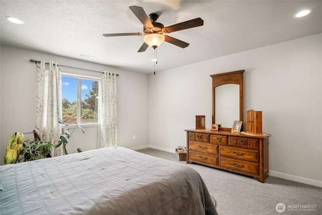 11975 NE Neppel Rd, Moses Lake, WA 98837 - carpeted bedroom featuring baseboards, recessed lighting, and a ceiling fan