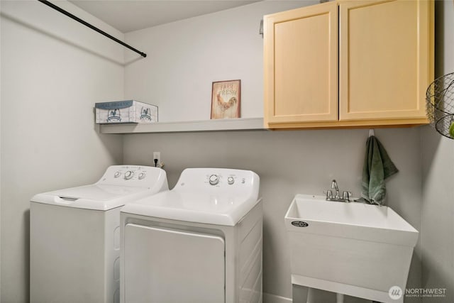 11975 NE Neppel Rd, Moses Lake, WA 98837 - laundry room featuring cabinet space and washing machine and dryer