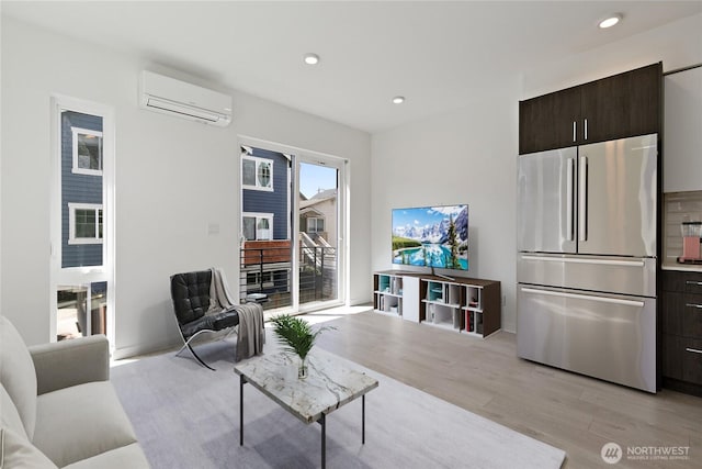 109 22nd Ave E Unit C, Seattle, WA 98112 - living room with light wood-style floors, a wall mounted air conditioner, and recessed lighting