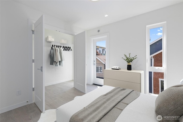 109 22nd Ave E Unit C, Seattle, WA 98112 - bedroom featuring light wood-style floors and baseboards