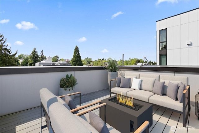 109 22nd Ave E Unit C, Seattle, WA 98112 - wooden deck featuring an outdoor living space with a fire pit
