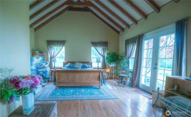 285 Pete Beck Rd, Quilcene, WA 98376 - bedroom featuring high vaulted ceiling, beamed ceiling, french doors, wood finished floors, and access to outside