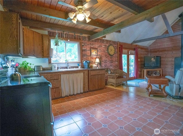 285 Pete Beck Rd, Quilcene, WA 98376 - kitchen with a sink, ceiling fan, dark countertops, wooden ceiling, and open floor plan