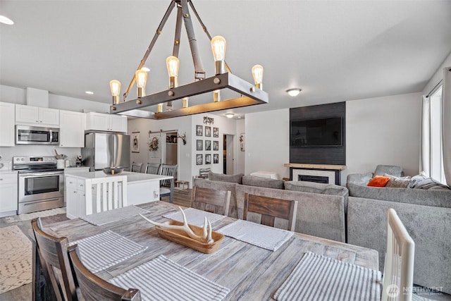 817 B St, Vader, WA 98593 - dining space featuring vaulted ceiling
