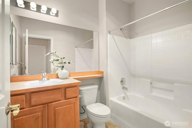 bathroom featuring toilet, vanity, and washtub / shower combination