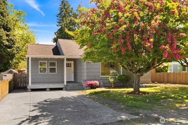 10236 1st Ave S, Seattle, WA 98168 - view of front facade featuring a shingled roof