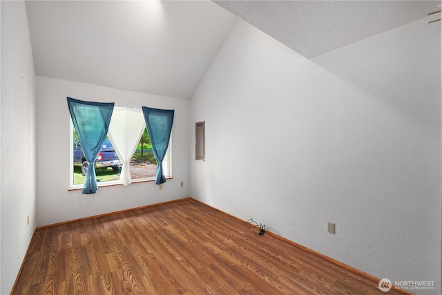 130 E Agate Dr, Shelton, WA 98584 - empty room with vaulted ceiling and wood finished floors
