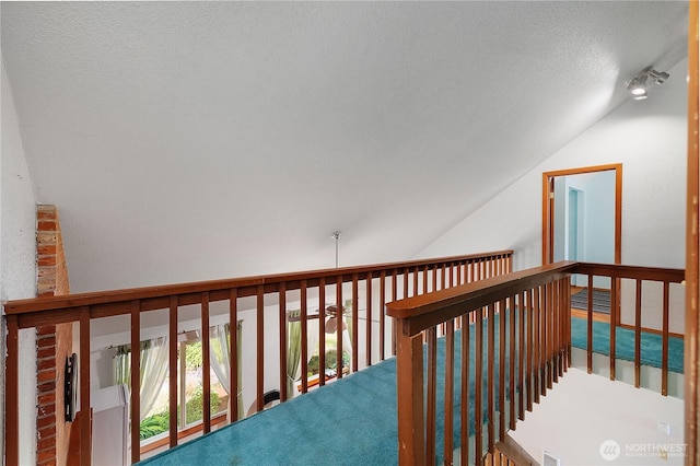 130 E Agate Dr, Shelton, WA 98584 - stairs with lofted ceiling and a textured ceiling