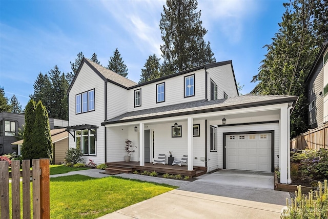 3815 NE 89th St, Seattle, WA 98115 - view of front facade with covered porch, concrete driveway, a garage, and a front lawn