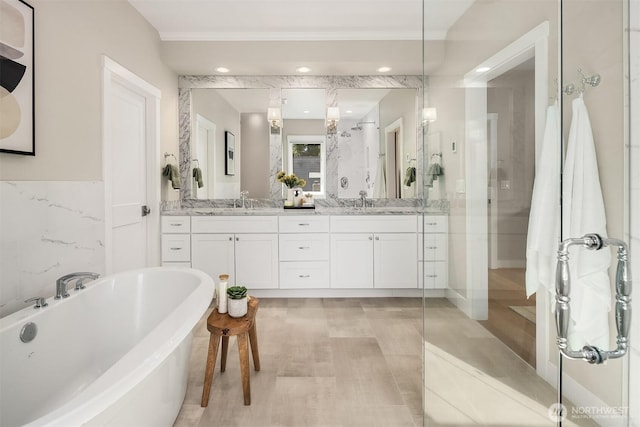 3815 NE 89th St, Seattle, WA 98115 - bathroom with double vanity, a freestanding tub, recessed lighting, and a shower with shower door