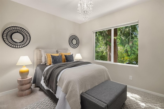 3815 NE 89th St, Seattle, WA 98115 - bedroom with baseboards, carpet floors, and a chandelier