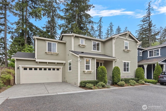 traditional home featuring driveway and a garage