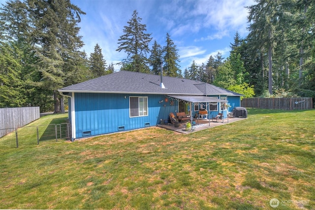 rear view of house with a patio and crawl space