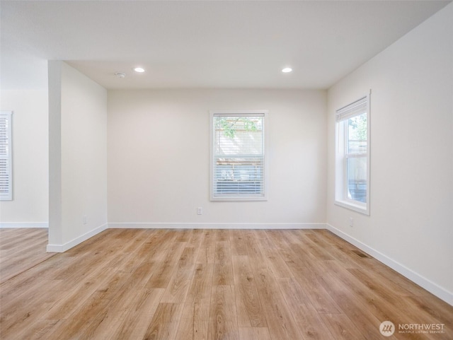 353 Mount Olympus Ave SE, Ocean Shores, WA 98569 - unfurnished room featuring plenty of natural light, light wood finished floors, baseboards, and recessed lighting
