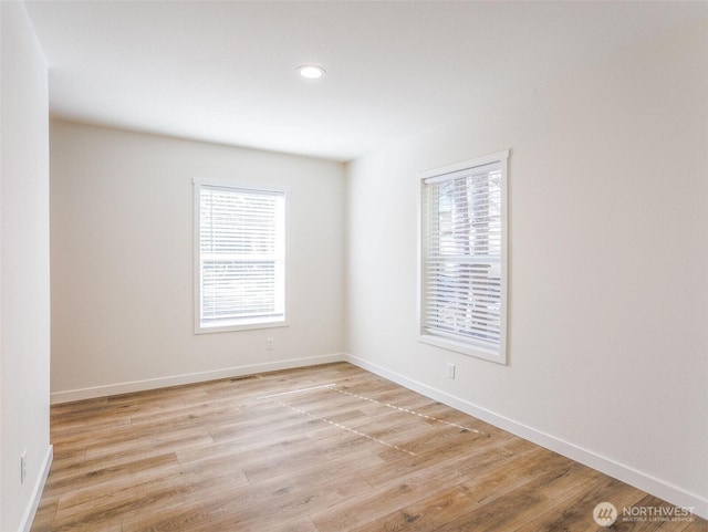 353 Mount Olympus Ave SE, Ocean Shores, WA 98569 - unfurnished room featuring light wood-style flooring, baseboards, and recessed lighting