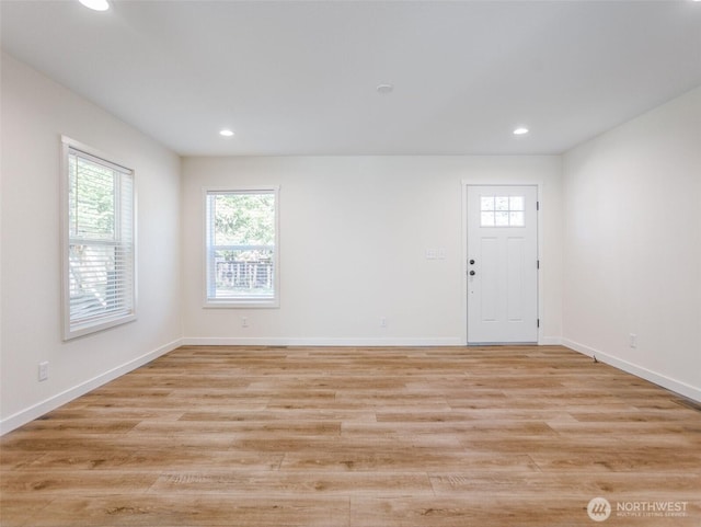 353 Mount Olympus Ave SE, Ocean Shores, WA 98569 - foyer with healthy amount of natural light, recessed lighting, baseboards, and light wood finished floors
