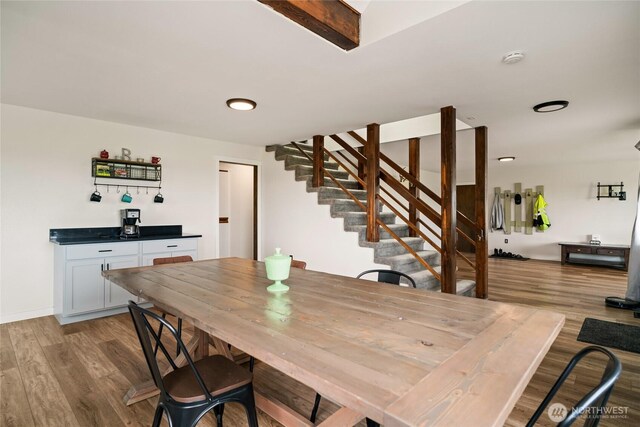 12062 Neppel Rd, Moses Lake, WA 98837 - dining area with wood finished floors, stairs, and baseboards