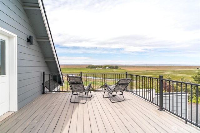 12062 Neppel Rd, Moses Lake, WA 98837 - wooden deck featuring a rural view