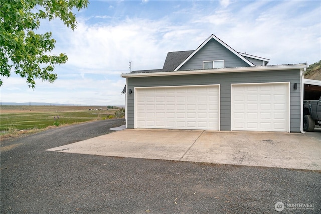 12062 Neppel Rd, Moses Lake, WA 98837 - garage with asphalt driveway