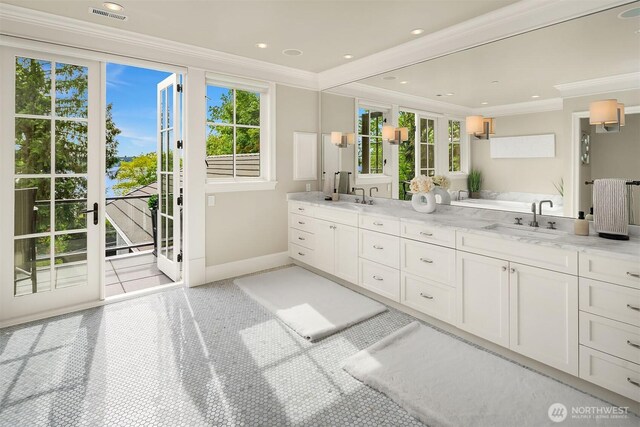 4207 Holly Ln, Mercer Island, WA 98040 - full bath featuring ornamental molding, baseboards, double vanity, plenty of natural light, and recessed lighting
