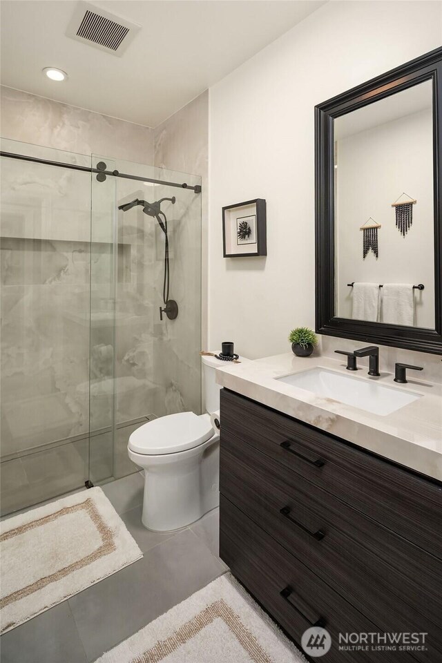 4207 Holly Ln, Mercer Island, WA 98040 - full bath with a shower stall, vanity, and toilet