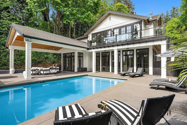 4207 Holly Ln, Mercer Island, WA 98040 - outdoor pool featuring outdoor lounge area, french doors, and a patio area