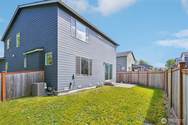 rear view of property with a patio area and central air condition unit