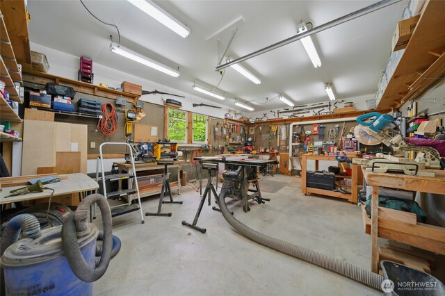 garage with a workshop area