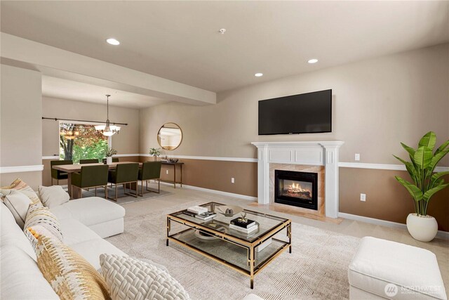2149 Inglewood Dr, East Wenatchee, WA 98802 - living room featuring baseboards, recessed lighting, a chandelier, and a premium fireplace