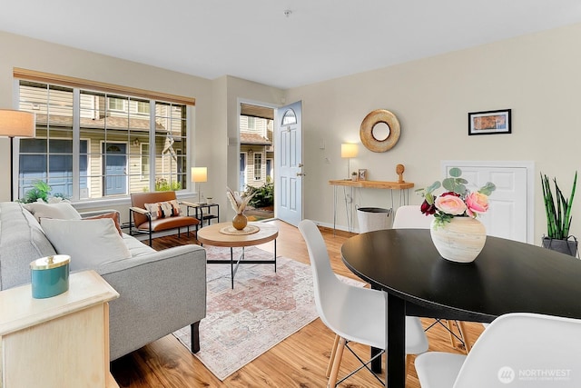 12549 Roosevelt Way NE Unit 13, Seattle, WA 98125 - living room featuring wood finished floors and baseboards
