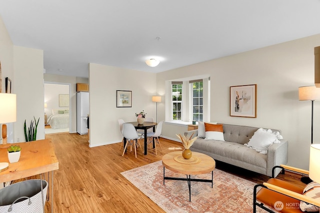12549 Roosevelt Way NE Unit 13, Seattle, WA 98125 - living area with light wood-type flooring and baseboards