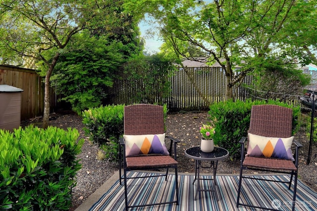 12549 Roosevelt Way NE Unit 13, Seattle, WA 98125 - view of patio featuring a fenced backyard