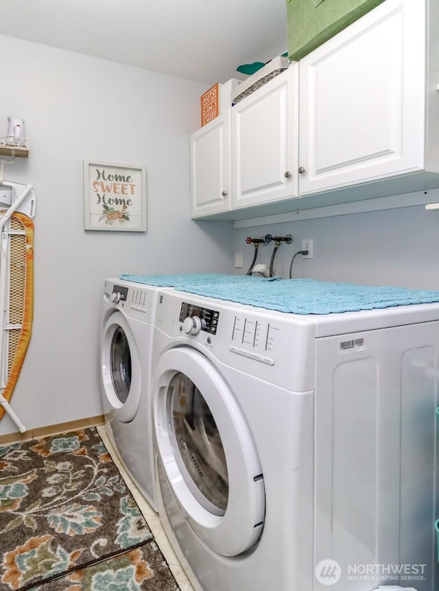 2949 Mile Hill Dr SE Unit C7, Port Orchard, WA 98366 - laundry area featuring cabinet space, separate washer and dryer, and baseboards