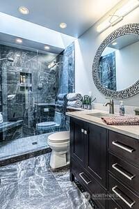 2117 130th Dr NE, Lake Stevens, WA 98258 - full bath featuring toilet, vanity, a stall shower, marble finish flooring, and recessed lighting
