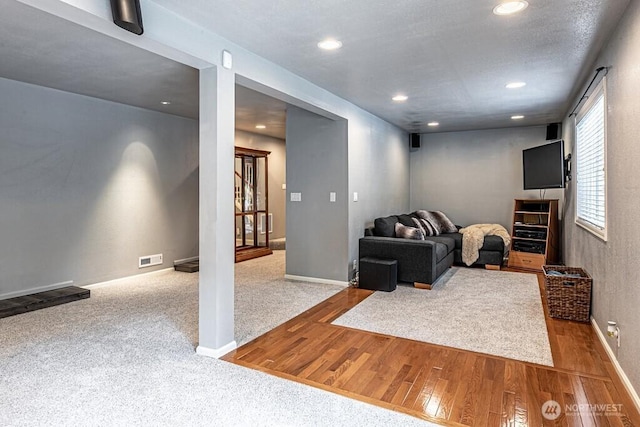 2117 130th Dr NE, Lake Stevens, WA 98258 - living area featuring recessed lighting, wood finished floors, and baseboards