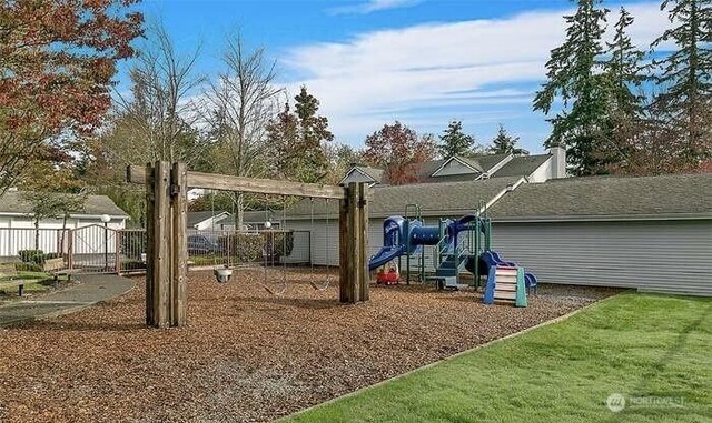 23313 Cedar Way Unit N205, Mountlake Terrace, WA 98043 - rear view of house with a playground