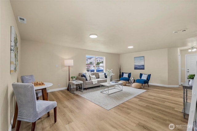 12570 SE 295th St, Auburn, WA 98092 - living room with light wood-type flooring and baseboards