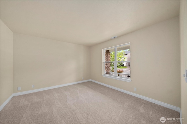 12570 SE 295th St, Auburn, WA 98092 - empty room featuring light carpet and baseboards